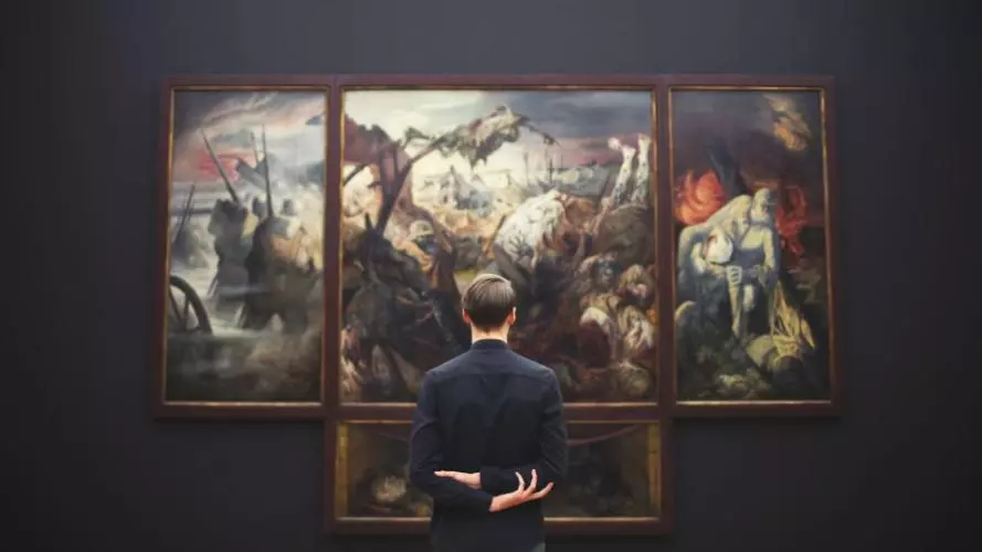 Man in front of screen