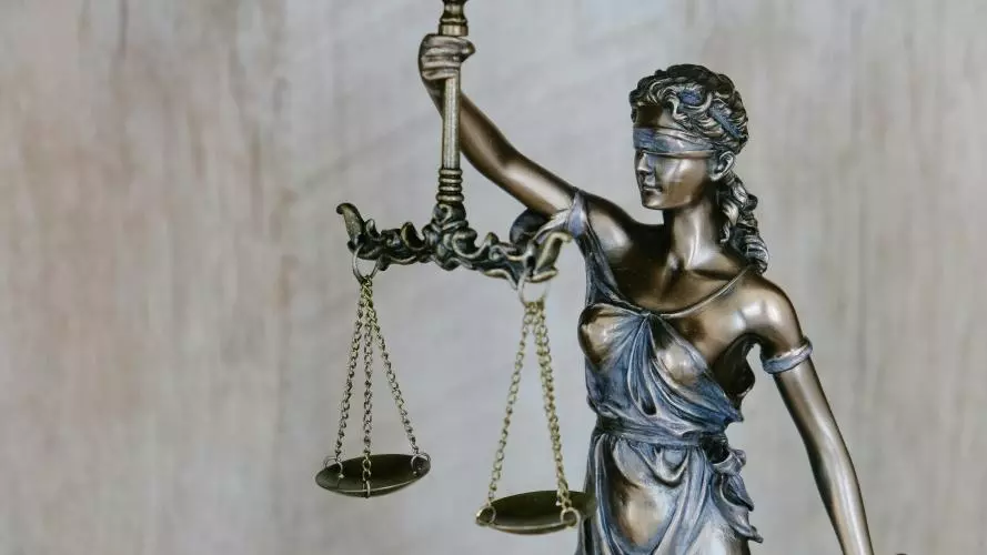 Statue holding scales