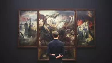 Man in front of screen