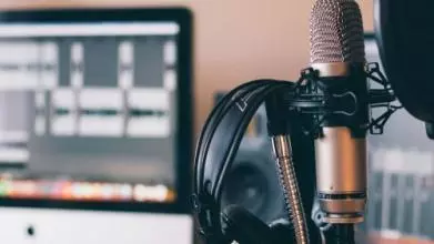 Image of microphone and a laptop